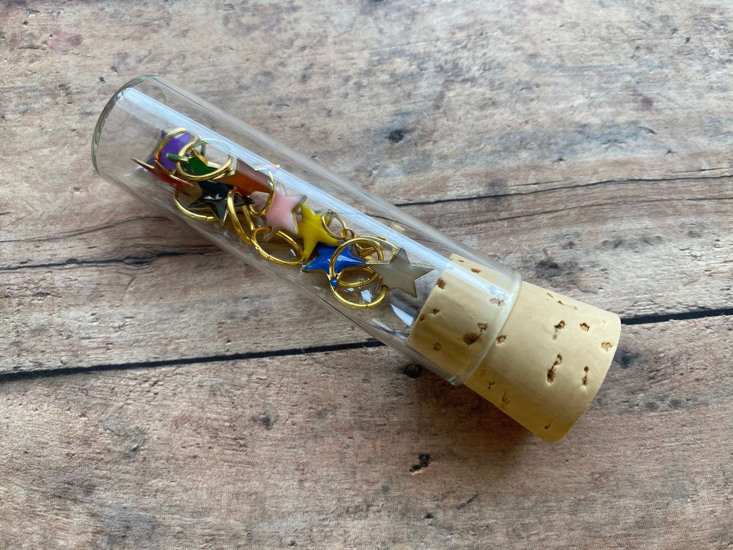 Rainbow Enamel Stars in a glass vial